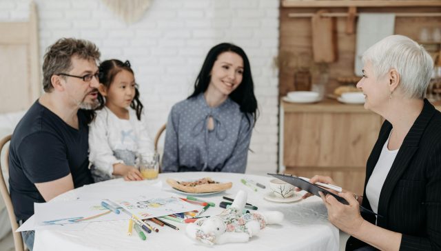 Family sitting around a table
